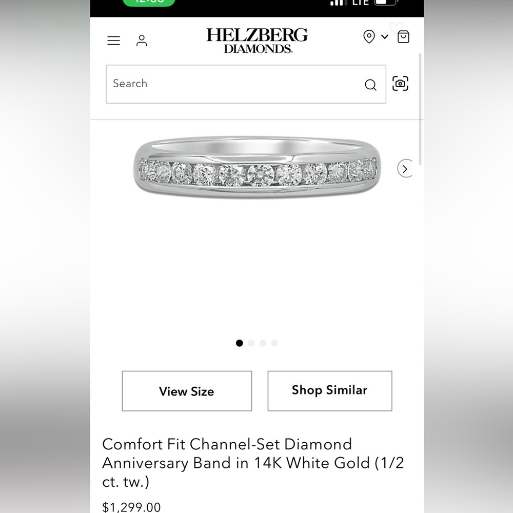 Helzberg Diamonds 1/2ctw
14kt WG Diamond Channel Set Ring